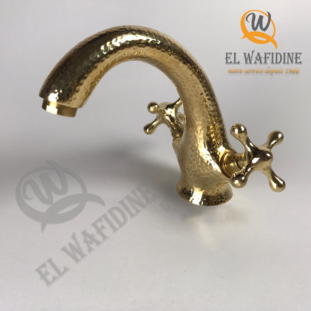 hammered brass faucet with cross knobs, uncoated brass