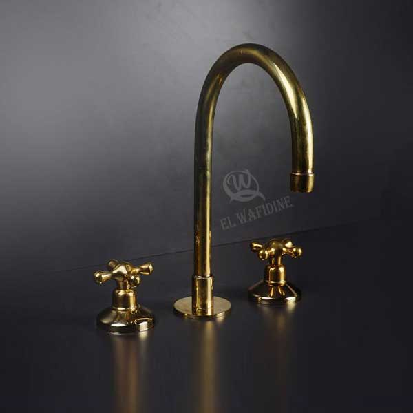 Widespread brass faucet with two cross handles