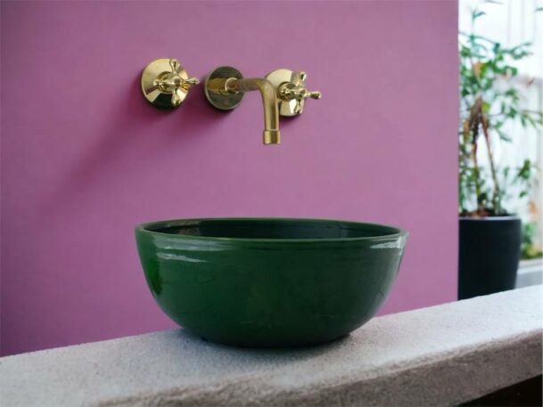 Handcrafted brass wall-mounted basin mixer